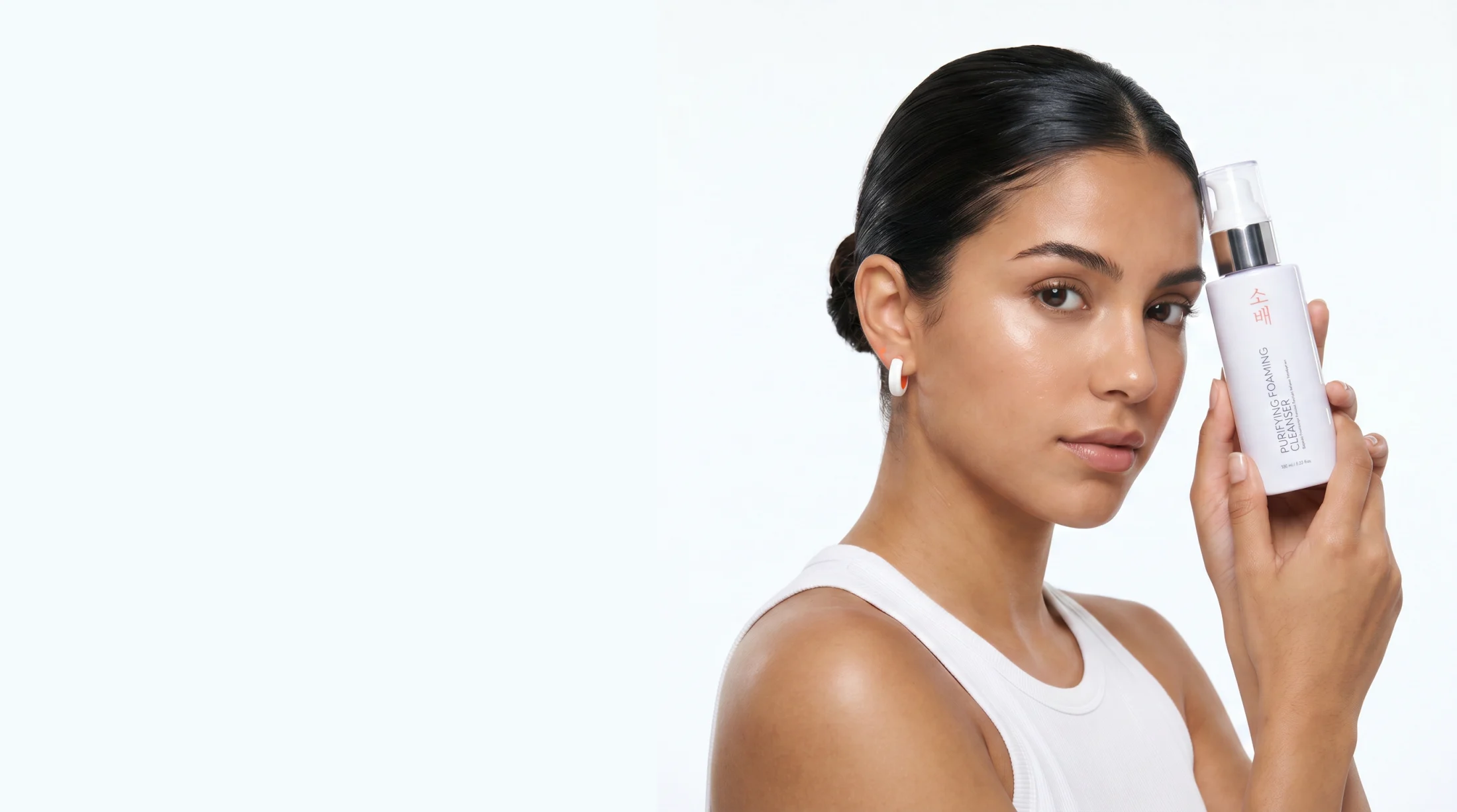 Model holding SOBAE Purifying Foaming Cleanser